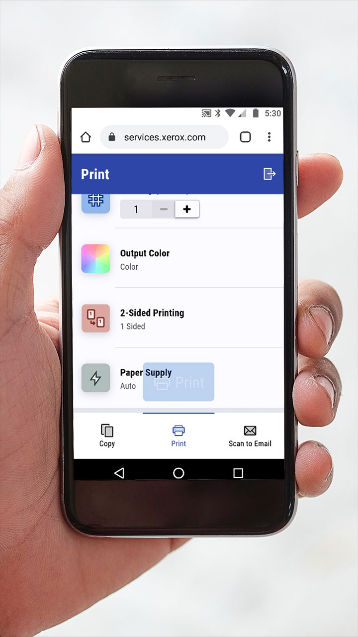 Man prepares document for Xerox MPS scanner using ConnectKey Apps